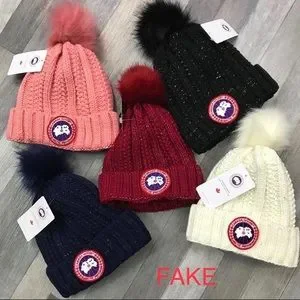 How to tell real vs rep - Canada Goose hats Real vs Replica Canada Goose HOW TO SPOT A FAKE CANADA GOOSE  main image 2